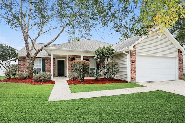 ranch-style home featuring a garage and a front yard