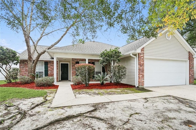 ranch-style home featuring a garage