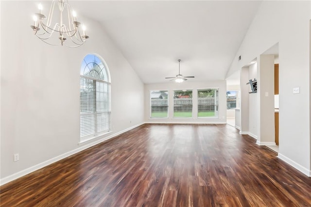 unfurnished living room with dark hardwood / wood-style floors, lofted ceiling, and ceiling fan with notable chandelier