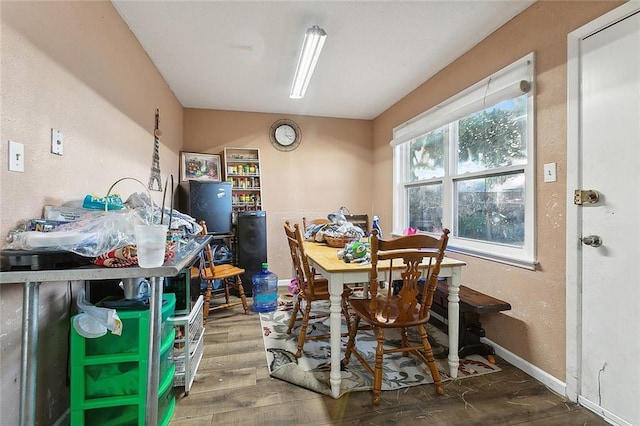 dining room featuring wood-type flooring