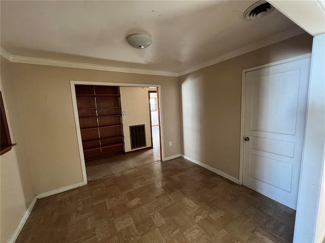 unfurnished bedroom with ornamental molding