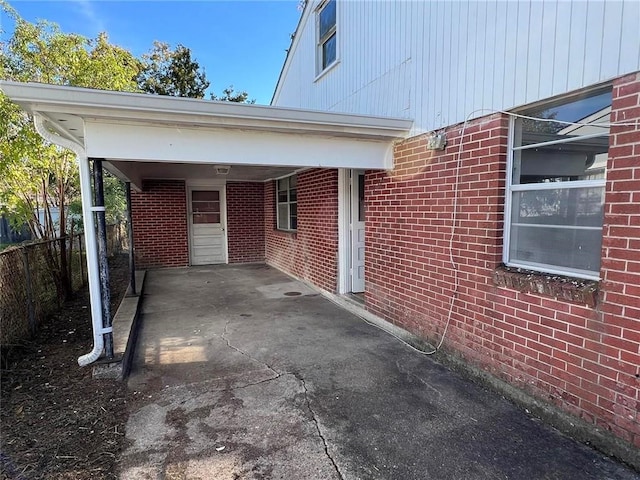 exterior space featuring a carport