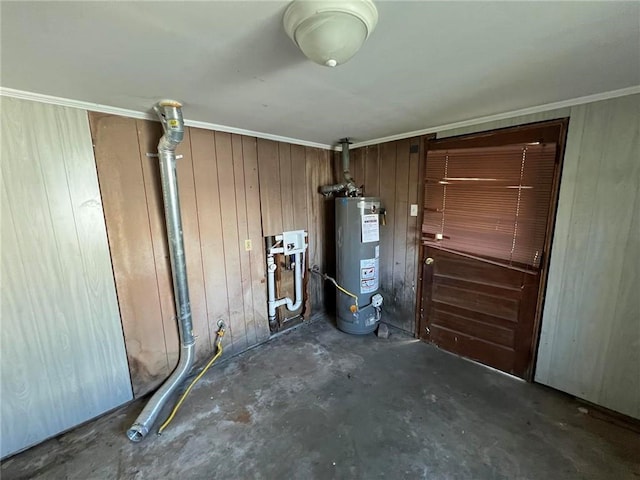 utility room with gas water heater