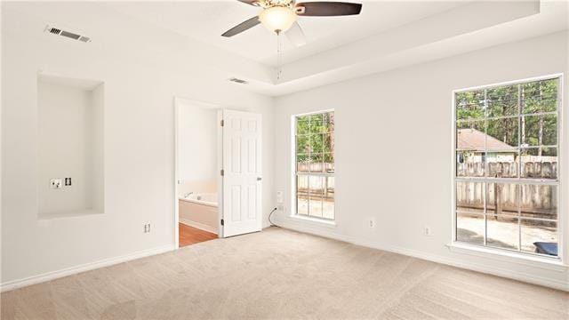 70081 9th St, Covington, LA 70433 - carpeted spare room with ceiling fan, plenty of natural light, and baseboards