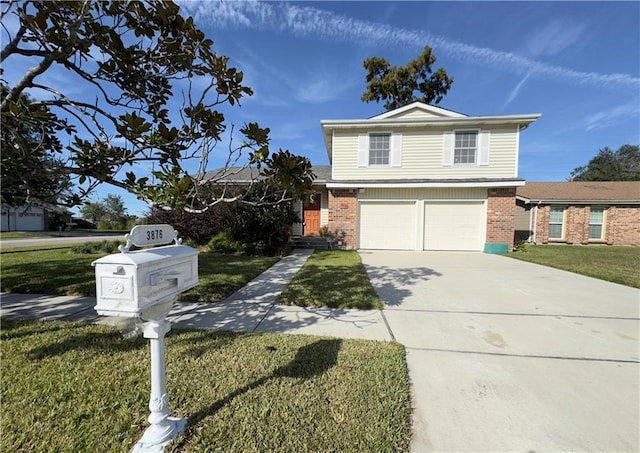 view of front of home featuring a front yard and a garage