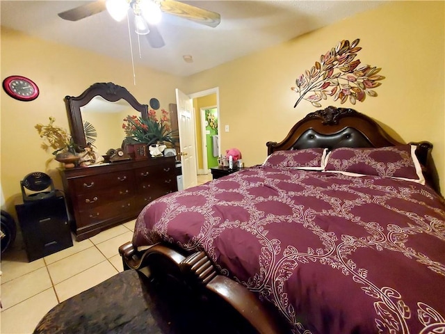 bedroom with light tile patterned floors and ceiling fan