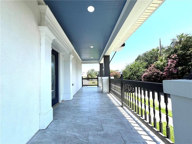 balcony featuring a porch