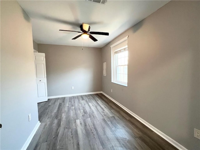 unfurnished room featuring hardwood / wood-style floors and ceiling fan