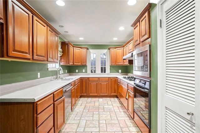 kitchen with sink and appliances with stainless steel finishes