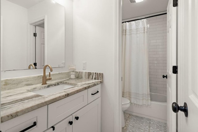 full bathroom featuring shower / bath combo with shower curtain, vanity, and toilet