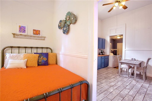 bedroom with washing machine and clothes dryer