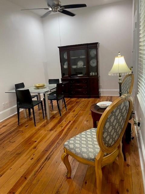 sitting room featuring ceiling fan and light hardwood / wood-style flooring