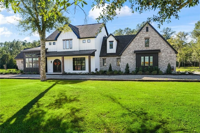 view of front of property with a front yard