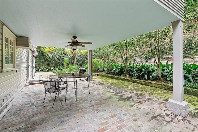 view of patio featuring ceiling fan