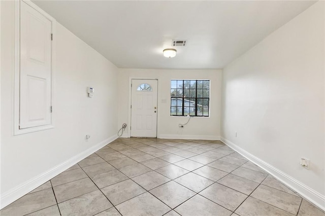 entryway featuring light tile patterned flooring