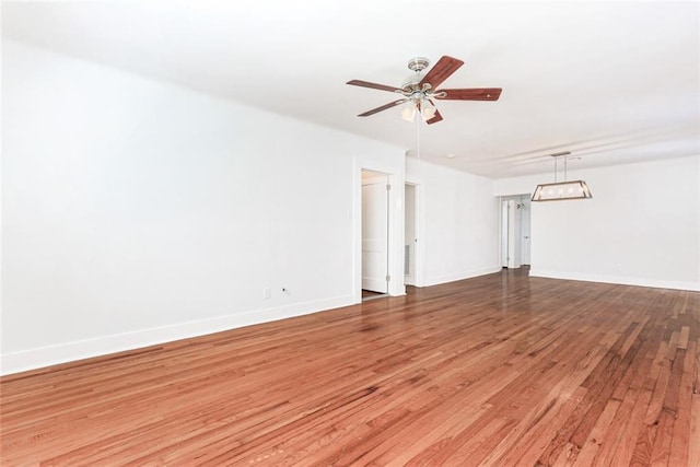 unfurnished room featuring hardwood / wood-style flooring and ceiling fan