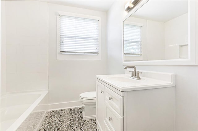 full bathroom featuring tile patterned flooring, vanity, bathing tub / shower combination, and toilet