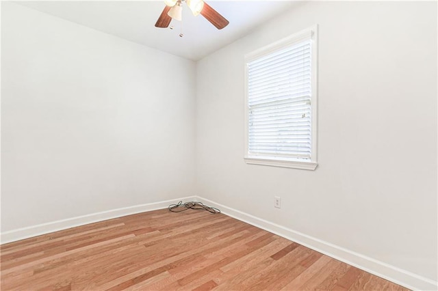 unfurnished room with ceiling fan and light hardwood / wood-style flooring