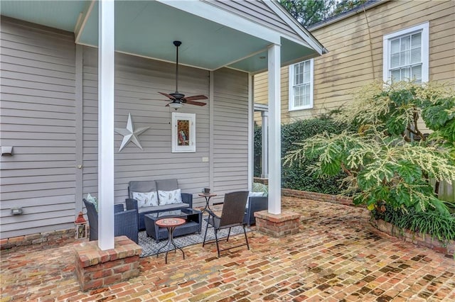 view of patio with ceiling fan and an outdoor hangout area