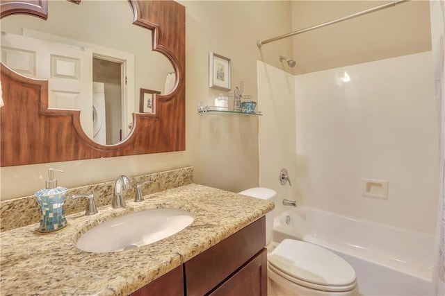 full bathroom featuring vanity, tub / shower combination, and toilet