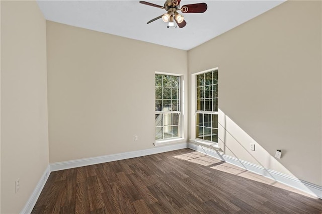 spare room featuring hardwood / wood-style flooring and ceiling fan