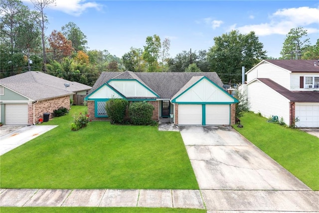 view of front of house with a garage and a front lawn