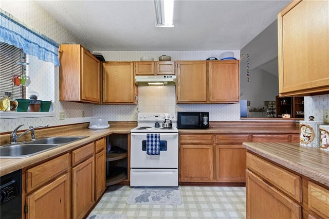 427 Drury Ln, Slidell, LA 70460 - kitchen featuring black appliances, light flooring, under cabinet range hood, light countertops, and wallpapered walls