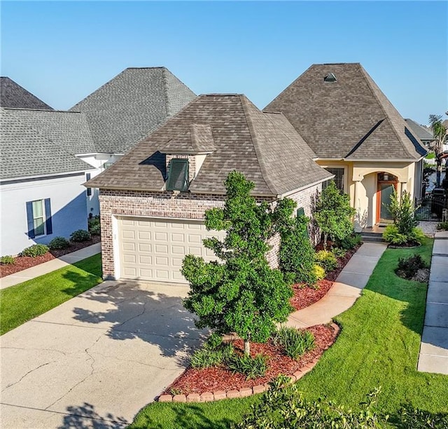 french country inspired facade with a garage