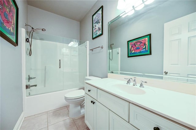 full bathroom featuring toilet, vanity, bath / shower combo with glass door, and tile patterned flooring