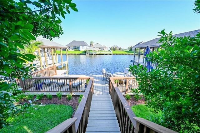 dock area with a water view