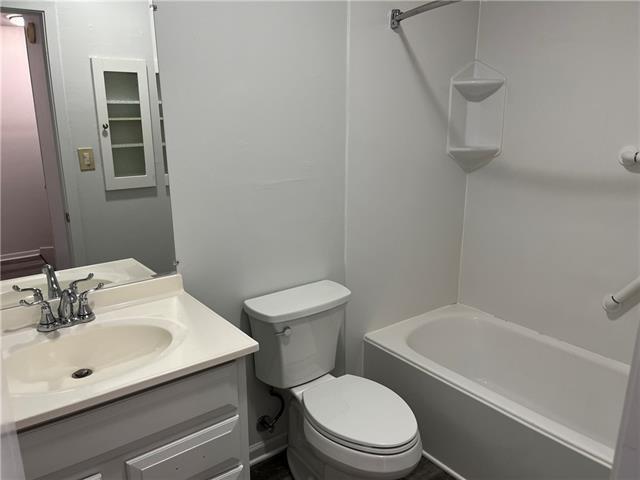 full bathroom with vanity, toilet, and shower / bath combination