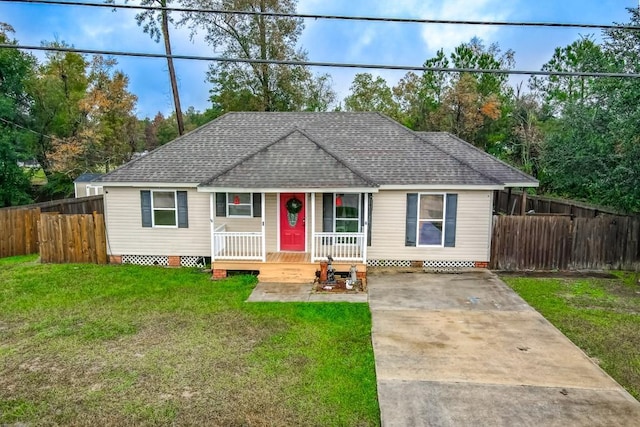 ranch-style house featuring a front yard and a porch