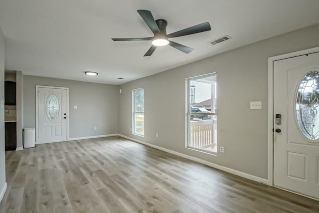 entrance foyer with light hardwood / wood-style flooring and ceiling fan