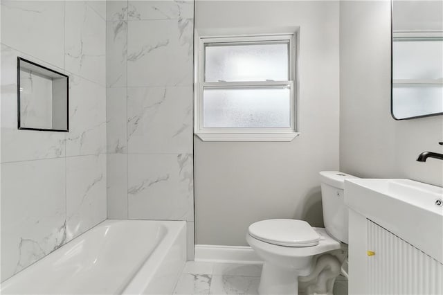 full bathroom with vanity, toilet, and tiled shower / bath combo