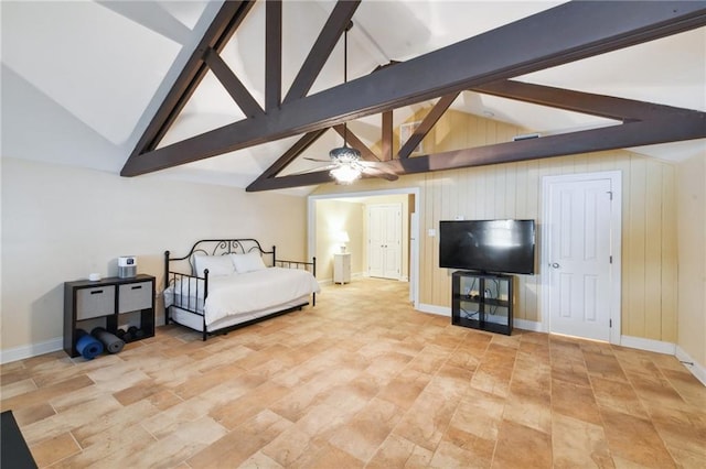 bedroom featuring vaulted ceiling with beams