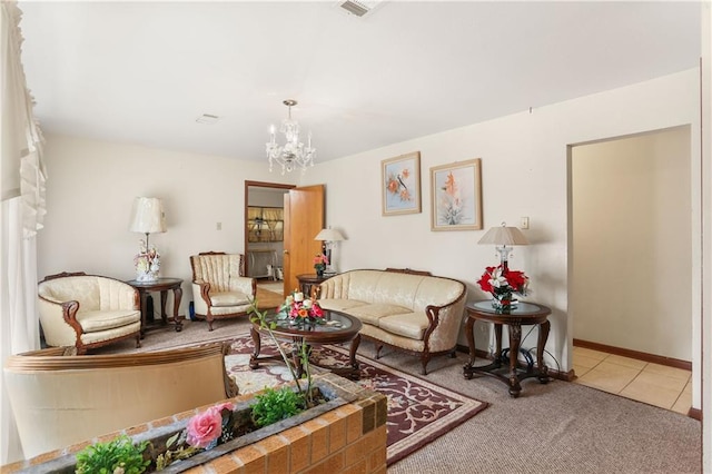 living room featuring carpet flooring and an inviting chandelier