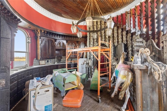 miscellaneous room featuring wood ceiling, sink, and hardwood / wood-style floors