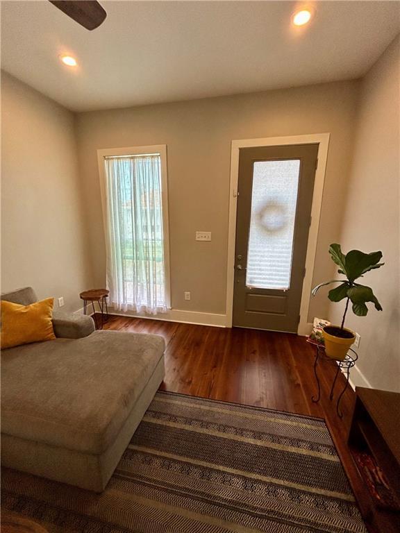 foyer entrance with dark hardwood / wood-style flooring