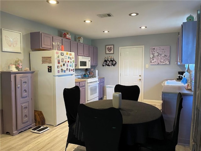 dining room featuring light wood-type flooring