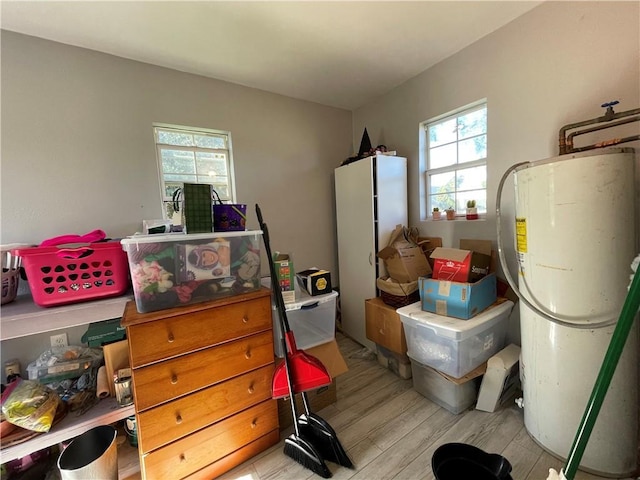 interior space featuring light hardwood / wood-style floors and water heater