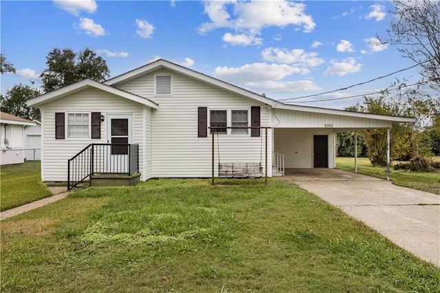 view of front facade featuring a front yard and a carport