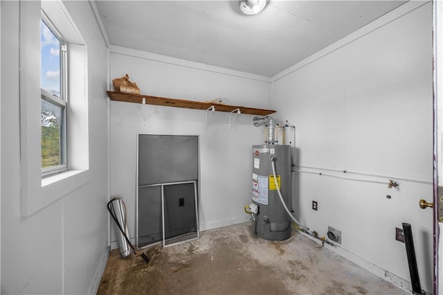 utility room with gas water heater