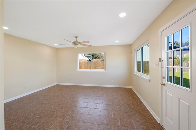 spare room featuring ceiling fan