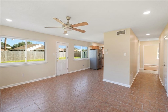 interior space featuring ceiling fan