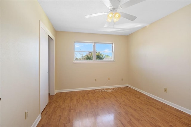 unfurnished bedroom with a closet, ceiling fan, and light hardwood / wood-style flooring