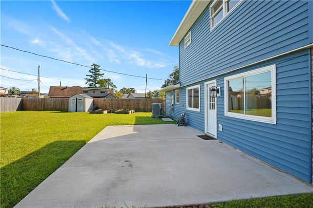 view of patio with a storage shed and central air condition unit