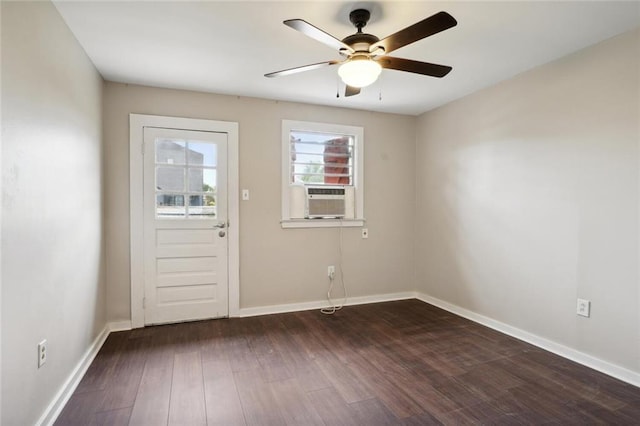 doorway with ceiling fan, cooling unit, and dark hardwood / wood-style floors