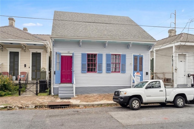 view of front facade with central AC unit