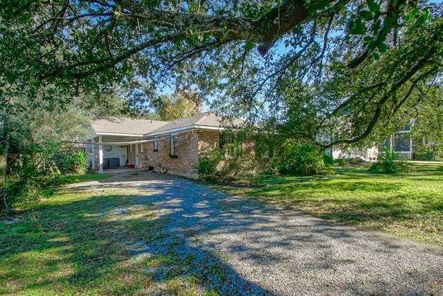 exterior space with a front lawn