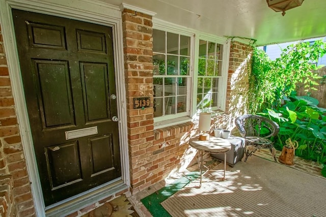 property entrance with a porch